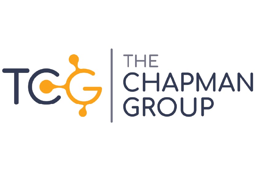 Logo for The Chapman Group, featuring TCG with interconnected orange nodes forming the letter G, next to a vertical line and the text THE CHAPMAN GROUP in blue capital letters.